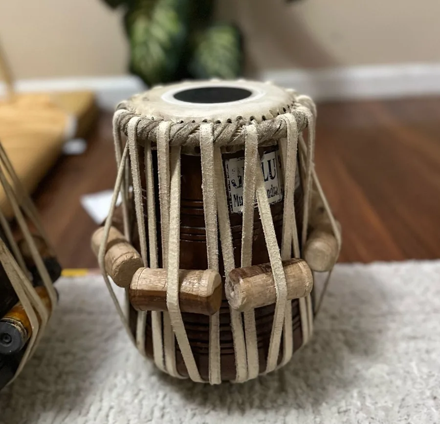 Hand-made tabla with leather straps and wooden dowels